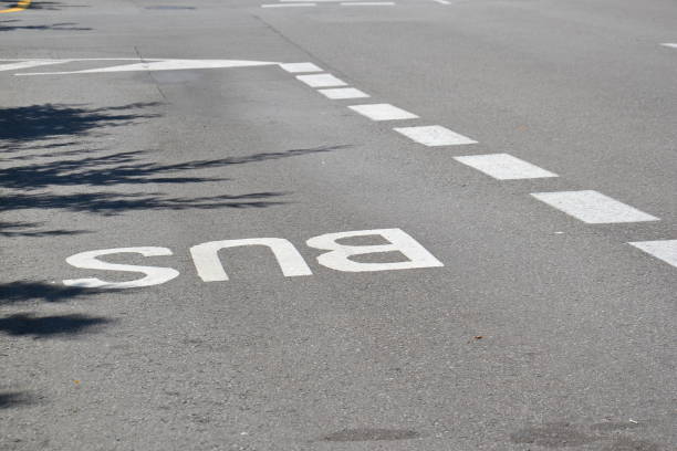 istock Asphalt road texture with signs after covid lockdown in Barcelona 1253632164