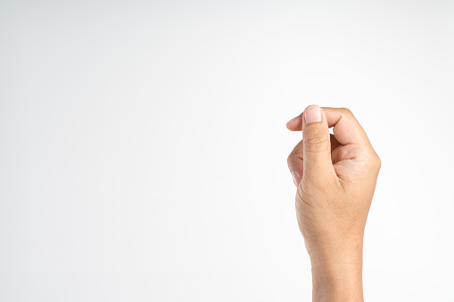 In a positive expression, a thumbs-up is showcased on a white background.