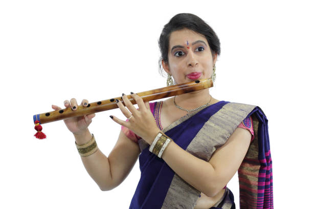 istock Indian Woman Playing Bansuri 1253632454