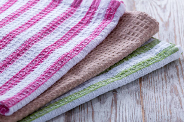 istock A stack of towels and napkins lying on the table. 1253632581