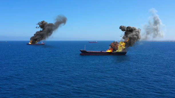 istock Cargo ships burning on fire with large scale smoke-Aerial 1253637422