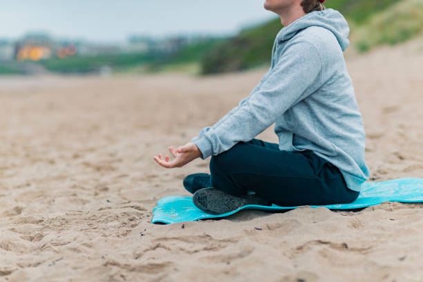istock Morning Yoga at the Beach 1253639842