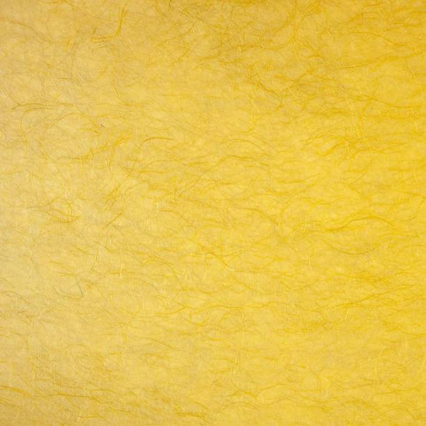 istock Yellow mulberry paper texture for background 1253641435