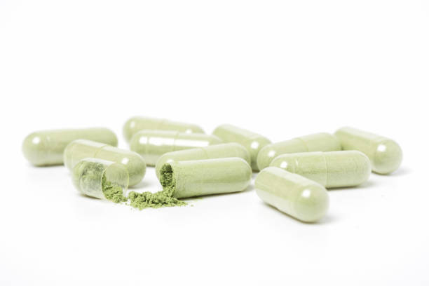 istock medicine herbal pill capsules 1253645900