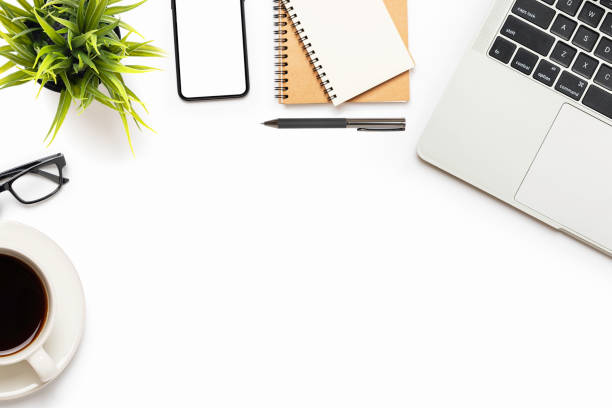 istock Flat lay of white office desk table or workplace with laptop 1253645961