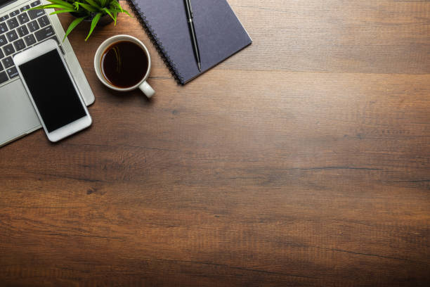 istock Flat lay of Office desk wooden table 1253645976