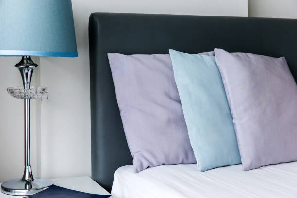 istock pillows on a bed Comfortable soft pillows on the bed 1253649247