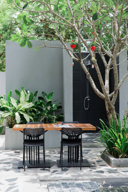 istock Tables and chairs in restaurant 1253649266