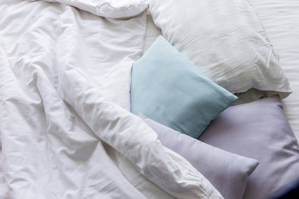 istock Top view of f bedding sheets and pillow 1253649284