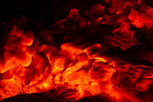 istock Fire and firewood burning in the fireplace 1253651267