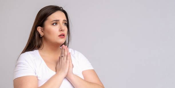 istock Plus Size Model with long hair posing in studio. be at one's de 1253654268