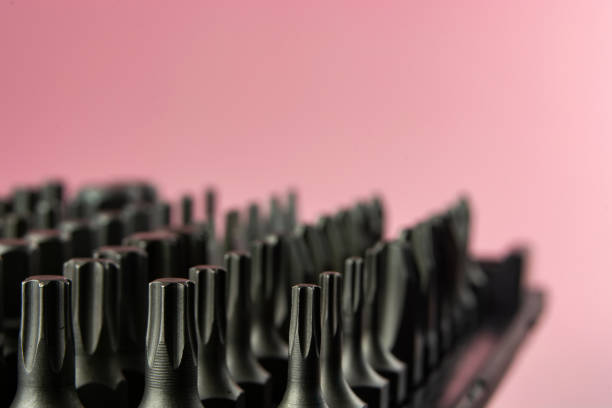 istock a set of metal bits for a screwdriver in plastic packaging 1253655221