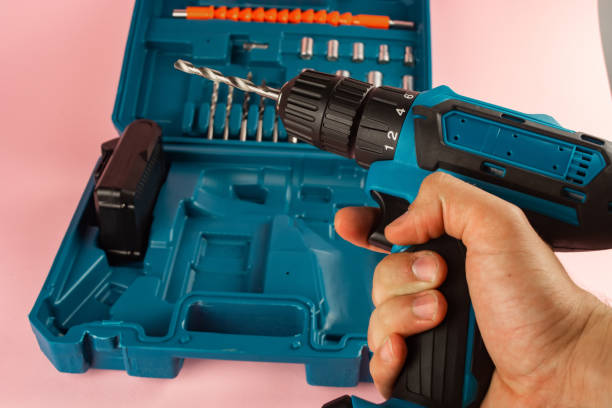 istock case with a screwdriver and nozzles on a pink background 1253655289
