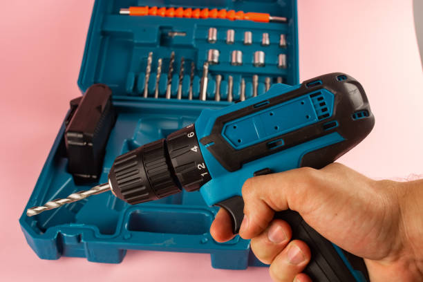 istock case with a screwdriver and nozzles on a pink background 1253655302