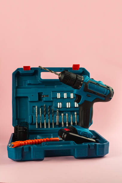 istock case with a screwdriver and nozzles on a pink background 1253655325