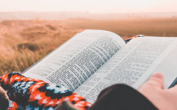 istock girl reads the bible 1253657740