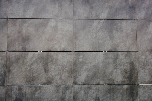 istock Concrete wall tile. Slate plate texture. Gray rough background 1253659277