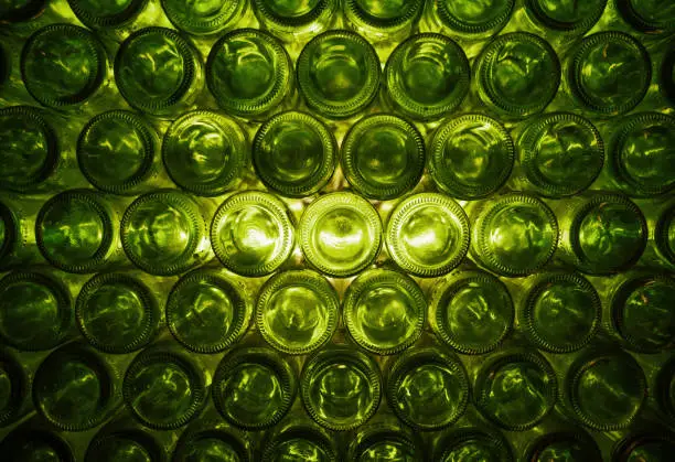 Photo of Green pattern of wine bottles