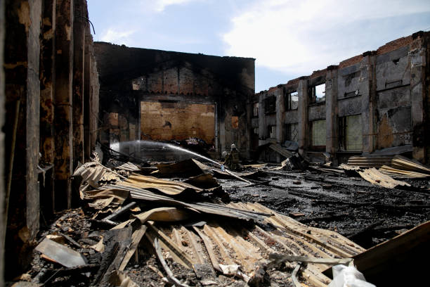 istock Burned house interior after fire, ruined building room inside, disaster or war aftermath 1253666676