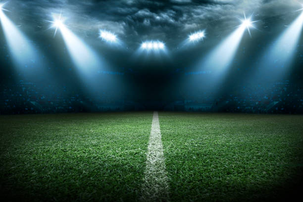 istock Soccer stadium arena with natural green grass 1253668011