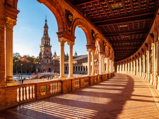 Spanish Steps in Seville View from a columned corridor of Seville's Plaza de España seville stock pictures, royalty-free photos & images