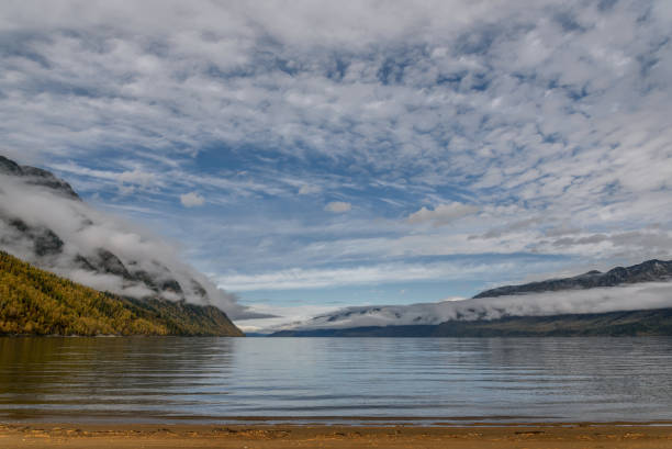 istock lake clouds fog mountains autumn 1253672310