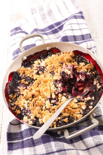 istock berries fruits crumble in pan 1253675060