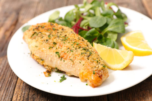 istock fried fish fillet with lettuce 1253675084