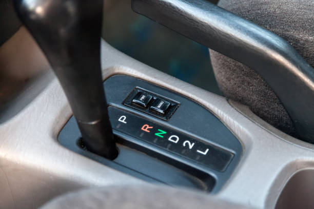 istock Automatic gearbox in the car on a gray background for movement and acceleration. Abstract image of fast speed. Warranty and recall of the transfer from the dealer. 1253676585