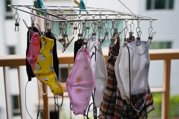 istock Face masks hanging after washing 1253676866