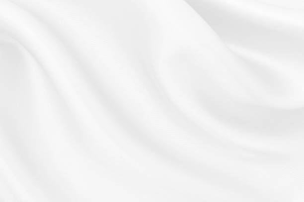 istock White fabric cloth texture for background and design art work, beautiful crumpled pattern of silk or linen. 1253677683