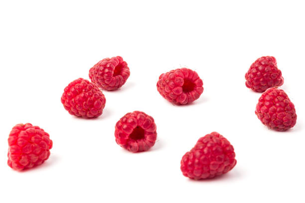 istock Fresh  red raspberry isolated on white background. Berry in close-up 1253677933