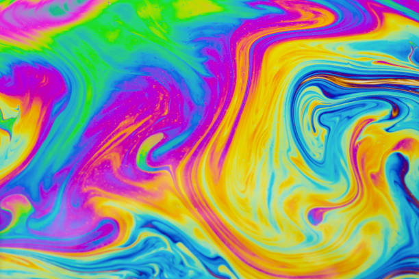 istock Psychedelic multicolored patterns background. Photo macro shot of soap bubbles 1253678863