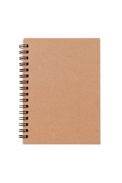 istock brown spiral notebook isolated on white background with clipping path 1253678876