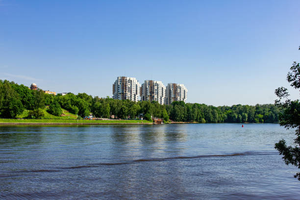 istock Landscape with a walk along the river embankment. 1253679392