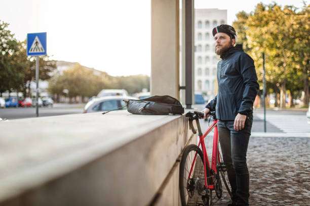 istock Bicycle messenger: commuter with road bicycle in the city 1253684989