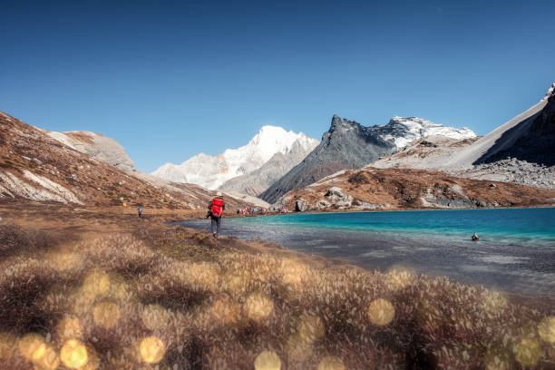 istock Tourist backpacker hiking on peak at Milk lake 1253687042