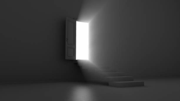 istock 3d render shine of an open door with steps in a dark room 1253688186