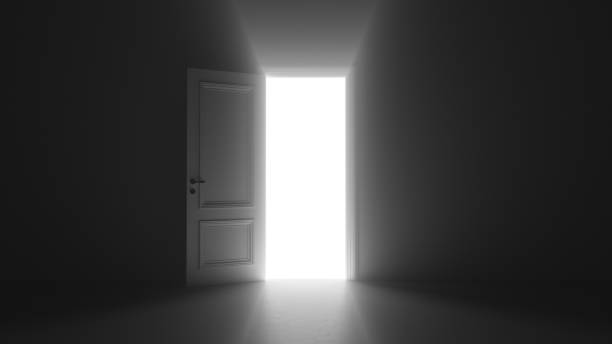 istock 3d render open door shine in dark room 1253688194