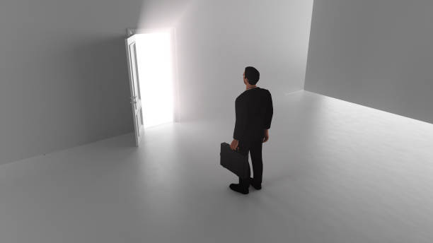 istock 3d render A business man walks through a shine door in a bright room 1253688231
