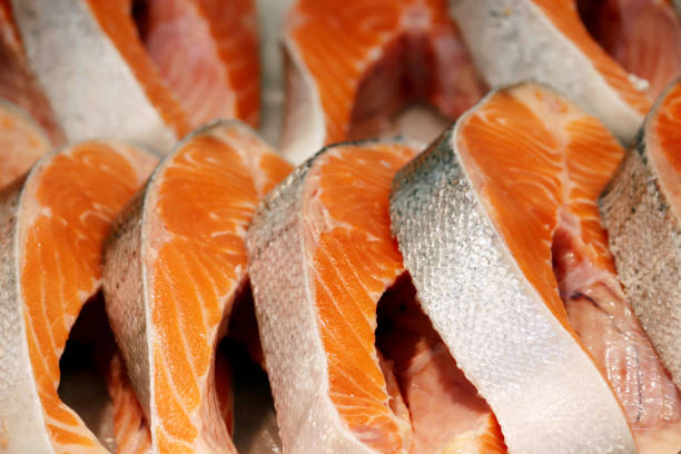 istock Fresh pink salmon steaks in the ice 1253688862
