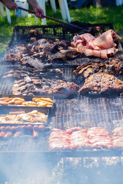 istock Different types and cuts of meat on a large country grill 1253690285