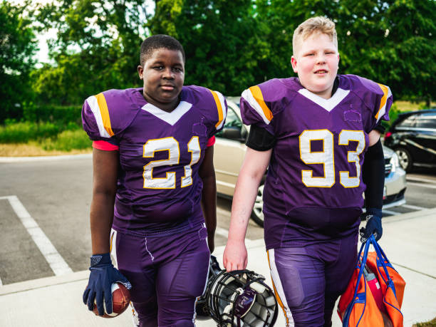 istock Junior Football players getting ready 1253692865