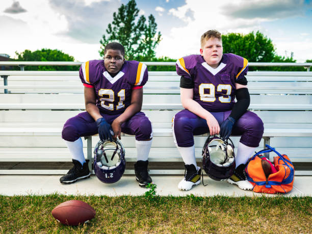 istock Junior Football players getting ready 1253692900
