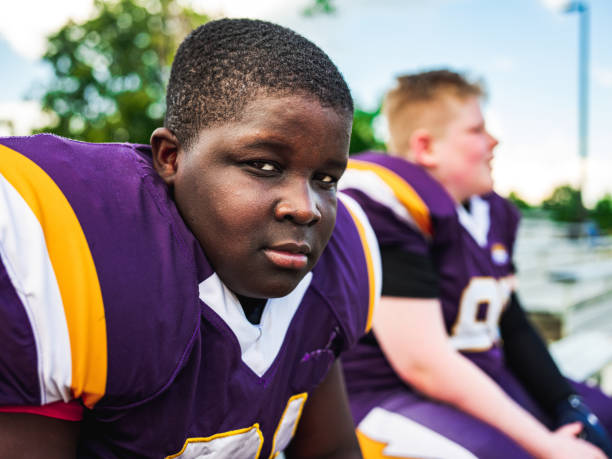 istock Junior Football players getting ready 1253692976