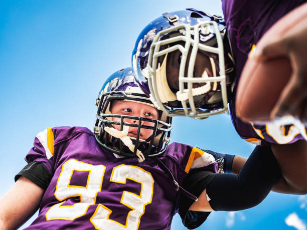 istock Junior Football players during game 1253693887