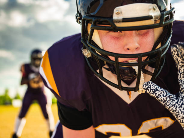 istock Junior Football players during game 1253694057