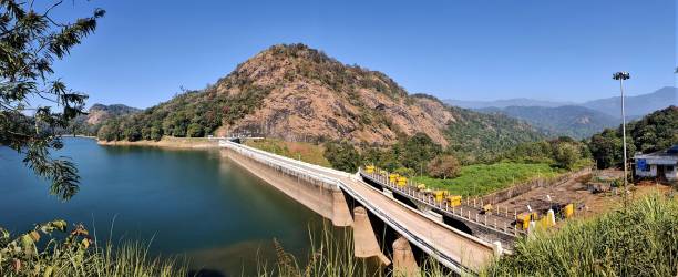 istock Beautiful Mattupetty Dam with blue sky and water 1253695353
