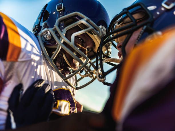 istock Junior Football players during game 1253696173