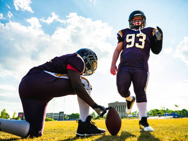 istock Junior Football players during game 1253696240